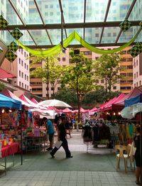 People at market stall