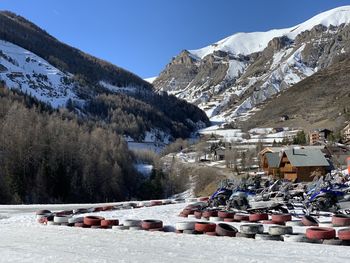 Scenic view of snowcapped mountains against sky