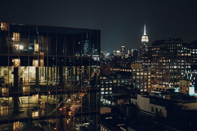 View of city lit up at night