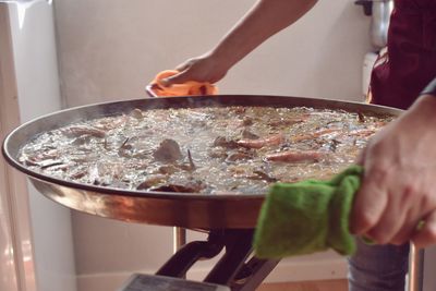 Close-up of person preparing food