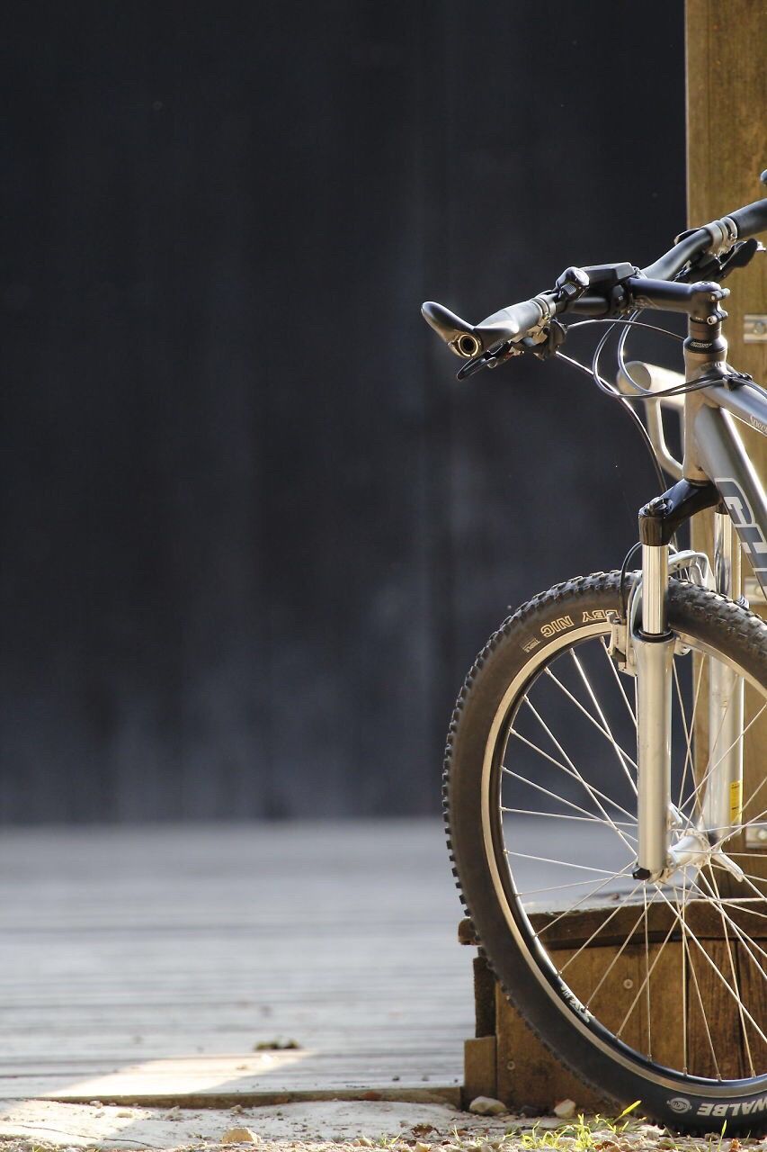 BICYCLES PARKED ON ROAD