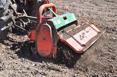 High angle view of abandoned machine on field