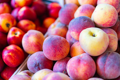 Full frame shot of peaches for sale at market