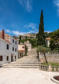 Buildings against blue sky