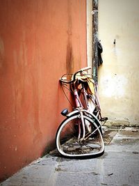 Close-up of bicycle in abandoned door