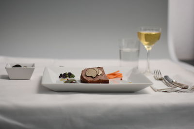 Close-up of food served on table