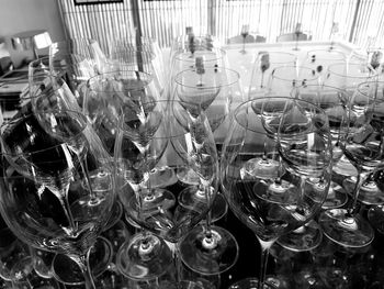 Close-up of wine glasses on table