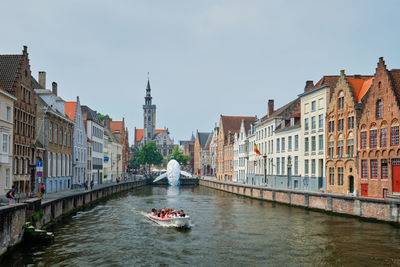 Tourist boat in canal. brugge bruges, belgium