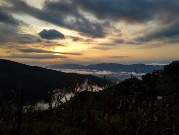 Scenic view of landscape against sky during sunset