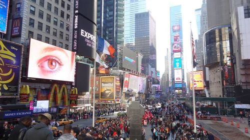 People on city street at night