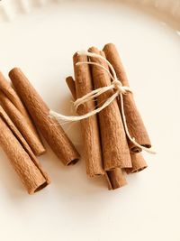 High angle view of bread on table against white background