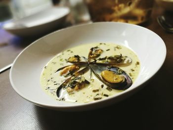 Close-up of seafood served in bowl on table