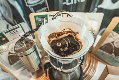 High angle view of coffee cup on table