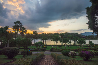 Scenic view of park against sky during sunset