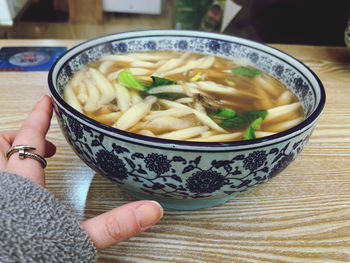 Midsection of woman holding food