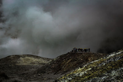 White island crater with people in the foreground