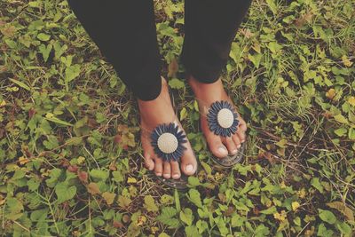 Sandals on women's feet.