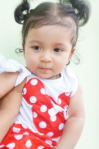 Close-up portrait of cute baby girl