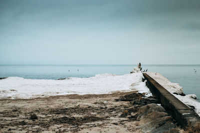 Scenic view of beach against sky