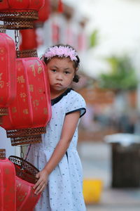 Portrait of cute girl standing outdoors