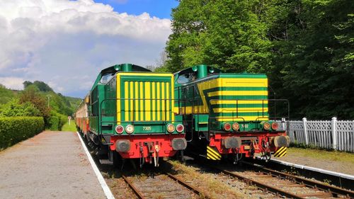 Train on railroad track against sky