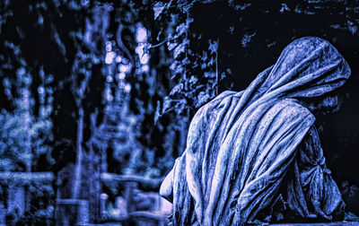 Person in snow covered forest