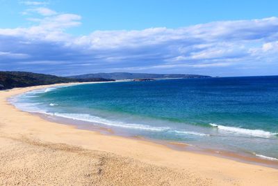 Scenic view of beach against sky