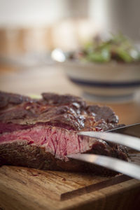 Close-up of steak on table in restaurant