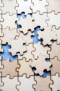 High angle view of wooden jigsaw puzzle