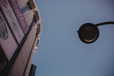 Low angle view of street light against clear sky