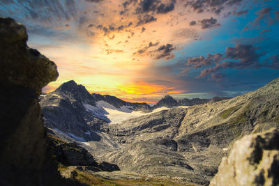 Scenic view of mountains against sky during sunset