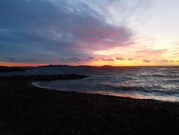 Scenic view of sea against sky during sunset