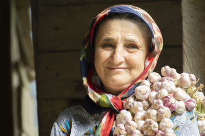 Portrait of senior woman in market