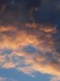 Low angle view of cloudy sky during sunset