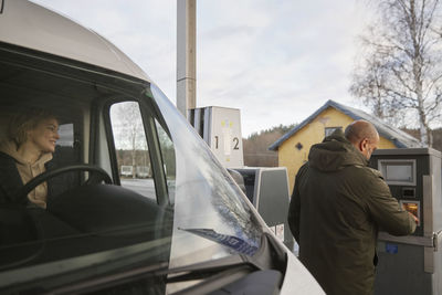 Couple at gas station