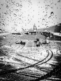 Full frame shot of raindrops on window