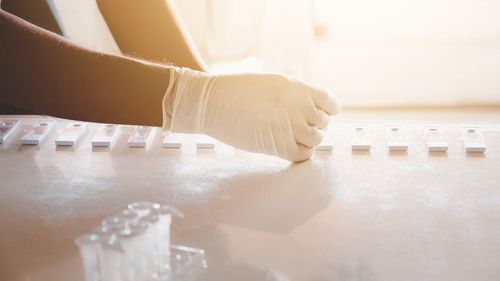 Close-up of man working on table