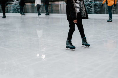 Low section of people on snow