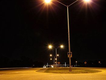 Illuminated street light at night