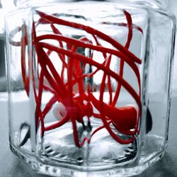 Close-up of glass jar on table