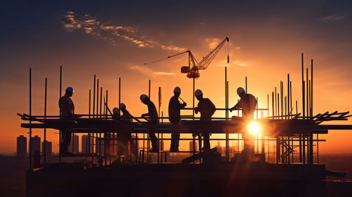 Silhouette of people at sunset
