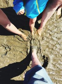 Low section of people on beach