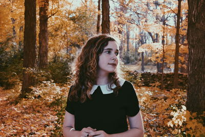 Portrait of teenage girl in autumn