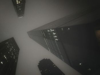 Low angle view of illuminated building at night