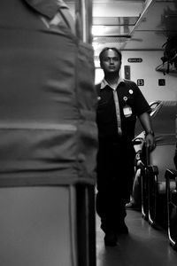 Man standing in corridor