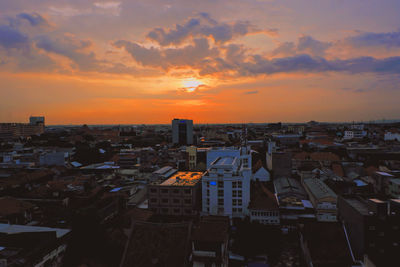 High angle view of townscape against sky during sunset