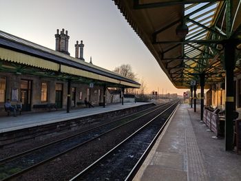 Railroad station platform against sky