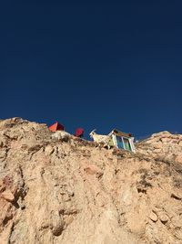 Low angle view of beach against clear sky