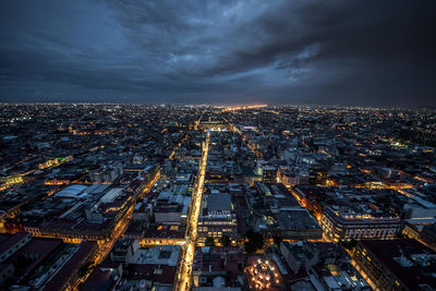 Illuminated cityscape at night