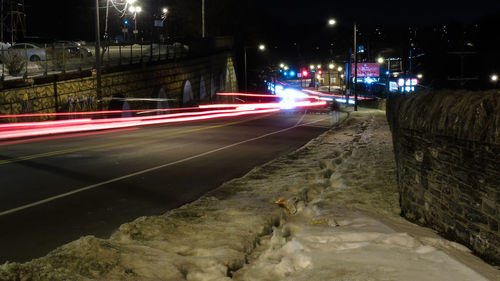 Light trails on road at night